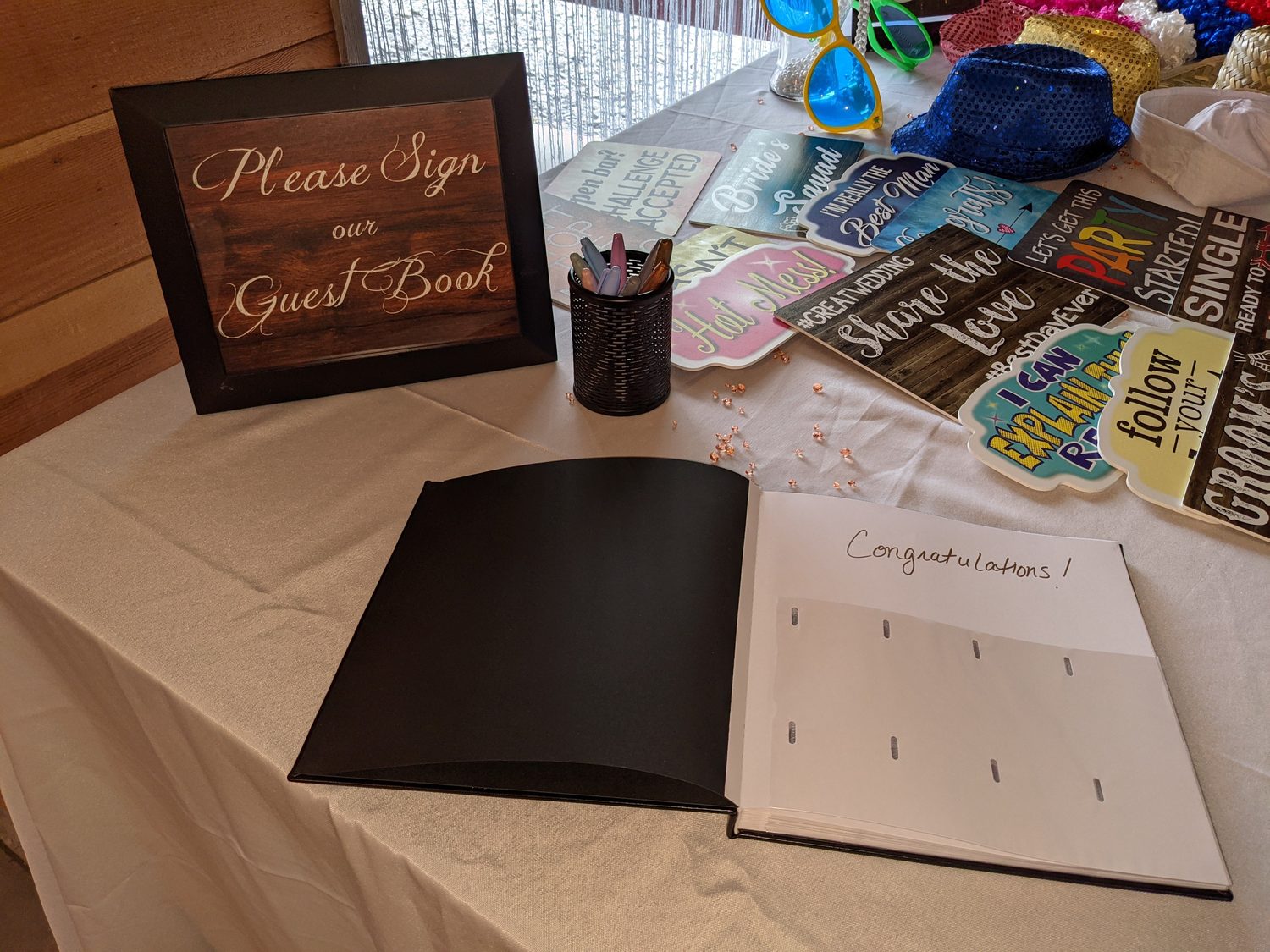 Photo booth guest book with prints and notes