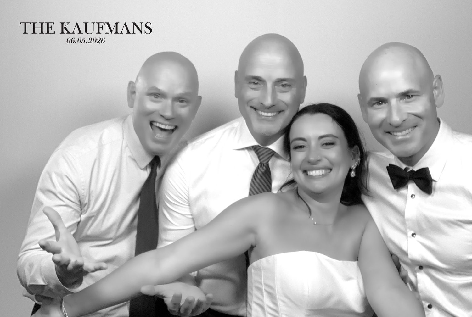 Photo booth print strip held by a guest