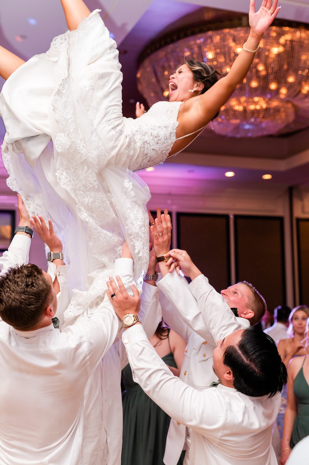 Guests celebrating on a full dance floor